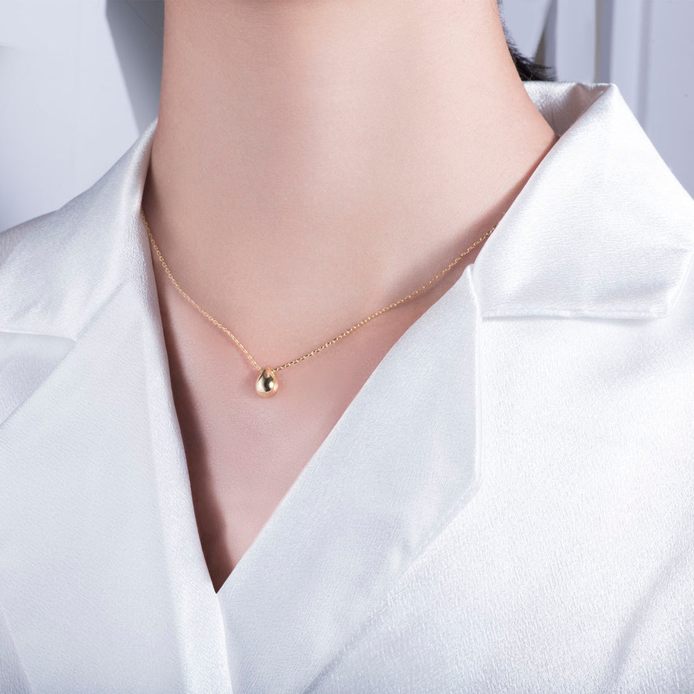 tiny simple teardrop necklace gold
